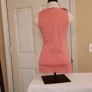 Fitted coral sleeveless blouse